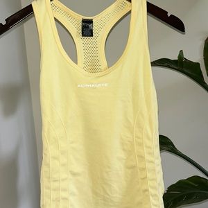 Alphalete yellow tank top, a size S slim fitting
